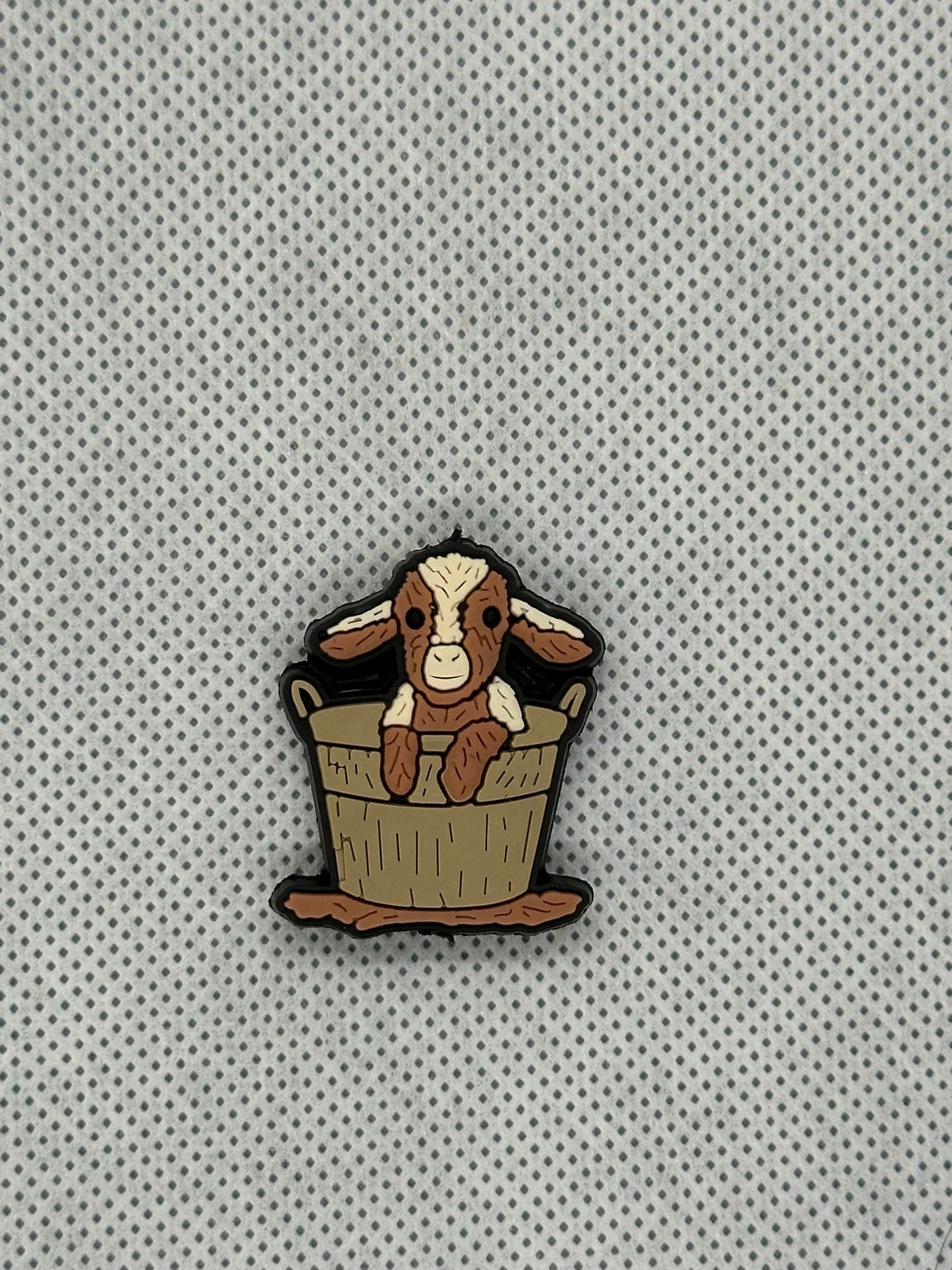 Goat in a bucket